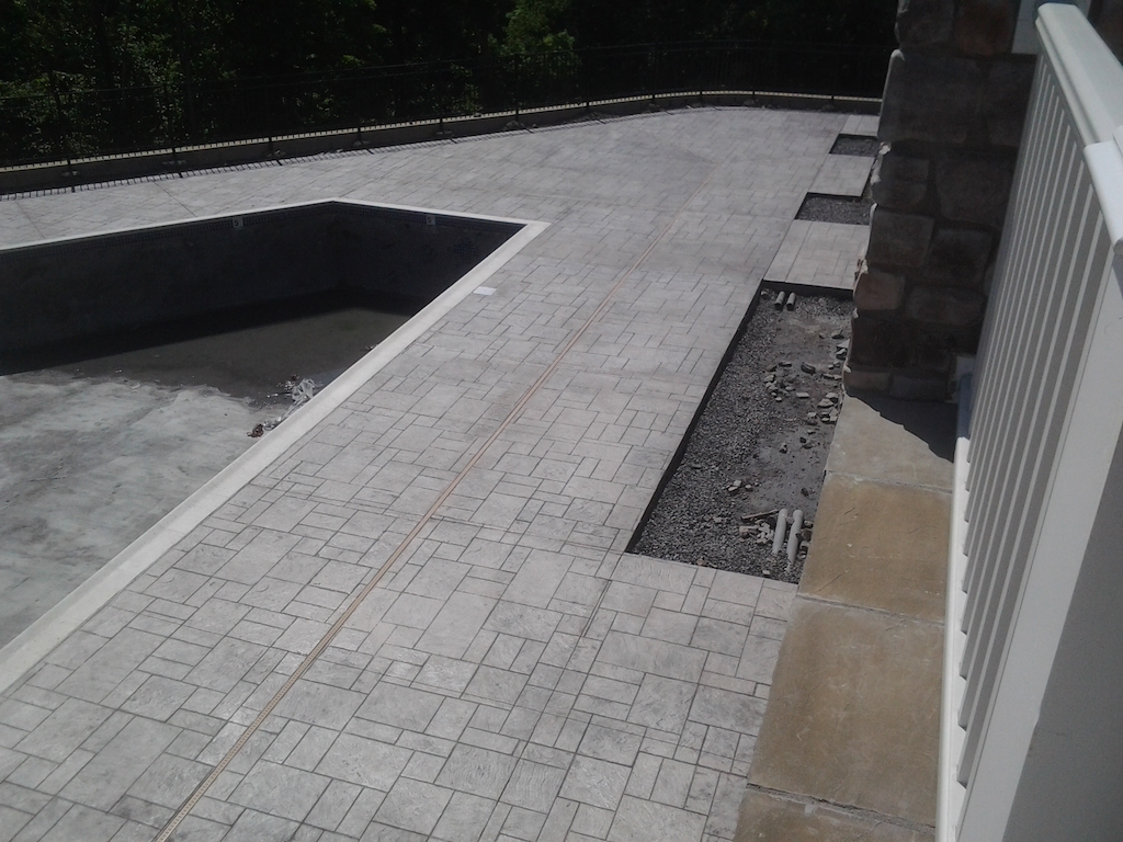 Decorative paver field with clean alignment and structured edge treatment